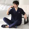 Pijama de verano para hombre hecho de gasa de algodón puro, de manga corta con pantalón largo, simple y casual, con cuello de solapa y diseño de botones, se puede usar fuera como conjunto de ropa para el hogar