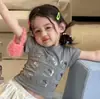 Conjunto de 2 Piezas para Niñas Estilo Coreano Verano Camiseta de Dibujos Animados Falda de Lunares y Pastel para Niñas, Atuendo Lindo Ajustado de Manga Corta de Verano