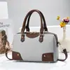 Exquisito bolso de mano para mujer, nuevo modelo 2026, bolso Boston de alta gama más vendido, moderno bolso de hombro y bandolera con tachuelas