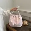 Bolsas Femininas Verão 2026 Nova Moda Bolsa Saco com Laço Elegante Bolsa de Ombro Feminina Bolsa de Braço Atacado
