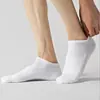 Calcetines deportivos lisos unisex de algodón de Xinjiang 7A, antibacterianos, para todas las estaciones, cortos, medianos y largos, resistentes al olor, transpirables, al por mayor