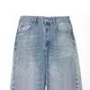 Venta al por mayor transfronteriza Primavera 2026 Moda europea y americana Versátil Casual Diseño desgastado Dobladillo enrollado Jeans para mujer E490469