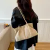 Bolso tote de ante de gran capacidad para mujer, nuevo bolso de hombro de moda vintage para otoño e invierno 2026, bolso versátil para ir al trabajo con una sensación de calidad