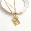 Pendente Cravejado com Diamantes de Aço Titânio Gravado Ouro Rosa Anel Duplo Romano Zircônia Colar Acessórios Femininos Atacado Versátil