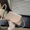 Bolso pequeño texturizado estilo occidental para mujer 2024 Nuevo Verano de mano para ir al trabajo color sólido bandolera moda portátil bolso cuadrado pequeño