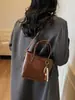 Bolso de Mano de Alta Gama Tipo Cubo para Mujer 2025 Otoño e Invierno Nuevo Bolso Tote Versátil Bolso de Hombro de Moda Bolso Cruzado Retro