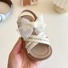 Sandalias para niños, novedad de verano 2025, zapatos de princesa con lazo para niñas, zapatos de verano de alto rendimiento a la moda con borde cruzado
