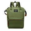 Novo estilo japonês grampo de arame grande bolsa feminina estudante mochila escolar lona cor sólida mochila fabricante impressão de logotipo