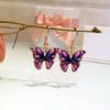 Conjunto de pendientes y collar de moda transfronteriza europea y americana, nuevo diseño de verano, con doble perla, aceite y mariposa, colgante para mujer.