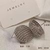 Pendientes de plata 925 chapados en oro y cobre con hebilla de oreja hueca de estilo exagerado con personalidad de Europa y Estados Unidos al por mayor transfronterizos para mujer