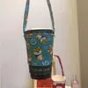 Funda para taza de té de leche portátil de dibujos animados de perro linda estilo Ins, bolsa de lona, funda aislante para taza de café anti-quemaduras al por mayor