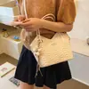Bolso de mano de lujo nicho de alta gama para mujer, nuevo bolso de hombro popular de moda primavera-verano 2026, bolso tote cruzado