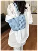Bolso cubo de un solo hombro calado estilo coreano para mujer, nuevo modelo de verano 2026, bolso tote tejido dos en uno para vacaciones y viajes