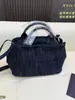 Bolso de mano vintage de mezclilla de diseño de alta gama, gran capacidad, simple y versátil para vacaciones y para ir al trabajo, se puede usar como bandolera o bolso de hombro para la playa