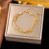 Pulsera de Cadena de Hueso de Serpiente Geométrica Simple Más Vendida en Europa y América para Mujeres, de Tres Capas, Lujo Ligero, Joyería de Acero de Titanio de Gama Alta