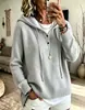 Nuevo suéter de punto con capucha de estilo europeo y americano, para otoño/invierno 2026, corte holgado, para mujer, color liso, con botones, manga larga, prenda exterior