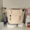 Bolsa de Mão Estilo Japonês Ins Fofa Bordada em Lona para Mulheres, Novo Modelo para Mães, Bolsa Tote Portátil para Sair, Lancheira para o Trabalho