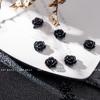 Arte de uñas Pequeñas joyas Camellia Tridimensional Resina negra Accesorios para uñas Entrada Lujo Internet Celebridad Diamante Joyería