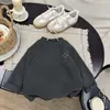 Ropa interior térmica gruesa para niños Invierno 2026 Nuevo Color Sólido Niños Versátil Terciopelo Arroz Pegajoso 320g Camiseta de Manga Larga Ropa Interior