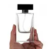 Venta al por mayor 60ml80ml100ml rectangular transparente vidrio embalaje de perfume botella con atomizador 15 bayoneta perfume botella vacía