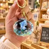 Colgante de Bolsita de Arena Movediza Oceánica Rellena de Aceite Llavero de Concha Animales de Dibujos Animados Delfín Pingüino Llavero de Muñeco Regalo