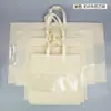 Bolsa de embalaje con cremallera de tela no tejida para textiles del hogar para mantas, cojines e insertos de almohada, bolso de mano transparente en stock con impresión de logotipo