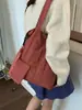 Bolso cruzado de color liso estilo japonés para mujer 2026 nuevo vintage de gran capacidad para hombro cruzado bolso de hombro simple bolso artístico
