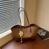 Bolso de axila de alta gama para mujer transfronterizo, nueva moda otoño 2026, bolso popular para la oficina y el trabajo, bolso tote versátil