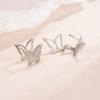 Aretes de mariposa de diamantes completos, hebilla para la oreja de lujo ligero, de alta gama, exquisitos, temperamento, diseño nicho, estilo coreano, estilo frío, niña, aretes flash