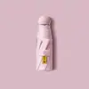 Mini sombrilla para mujer, protección UV, recubrimiento negro, plegable, paraguas cápsula compacto y portátil, adecuado tanto para días soleados como lluviosos