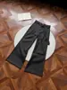 Pantalones de mujer de corte holgado estilo old money con rayas texturizadas y cinta retro de patrón oscuro desmontable, para hombre, de pinzas sencillas, jacquard negro
