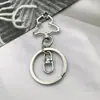 Montagem de árvore de Natal DIY combinação chaveiro liga de zinco pingente de bolsa cor de galvanoplastia mola pode ser aberta