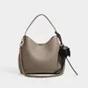Bolso tote de cuero suave de alta calidad transfronterizo para mujer, nueva colección 2026, diseño ligero de cadena de lujo, casual y elegante, se puede llevar como bolso de hombro o bolso cruzado, e incluye una bolsa interior más pequeña