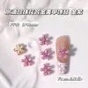 Nuevas Decoraciones de Arte de Uñas de Aleación con Flores de Perlas de Colores Flores de Cinco Pétalos de Dopamina Gotas de Agua Decoraciones para Uñas DIY
