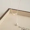 Colar de Pérolas Pequeno em Formato de Y para Mulheres, Versátil, de Nicho, Luxo Leve, Corrente de Clavícula de Alta Qualidade, Colar Minimalista Estiloso Estilo Ins