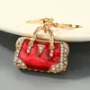 Llavero Colgante para Bolso de Mujer con Diseño Creativo de Goteo de Aceite de Lujo Ligero Europeo y Americano, Llavero Accesorio para Bolso de Mujer Incrustado con Diamantes Exquisitos Venta al por Mayor