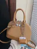Bolsa Shell Retrô Cor Contrastante 2025 Nova Textura da Moda Mais Fácil de Combinar Bolsa de Mão Casual Estilo Ocidental Bolsa de Ombro Transversal Bolsa Feminina