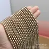 Cuentas de vidrio de imitación de perlas Swarovski de alta gama en tonos marrones con agujeros rectos para accesorios de collares hechos a mano DIY productos semiacabados