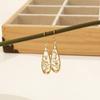 Nuevos pendientes de flor seca de moda moderna transfronterizos europeos y americanos pendientes de flor eterna Pendientes de flor real retro chapados en oro