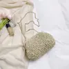 Bolsa de Palha Trançada 2026 Novo Estilo Estilo Floresta Menina Doce Moda Vazada Bolsa de Ombro Elegante Corrente Transversal Bolsa de Praia