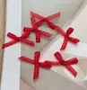 Suministro directo de fábrica encaje un punto moño pequeño calcetines para ropa interior accesorios pequeños accesorios para ropa accesorios moño venta al por mayor