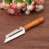 Um yuan multi-funcional cabo de madeira pontiagudo Planer aço inoxidável descascador cortador de frutas melão e descascador de frutas