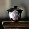 Tazón Cubierto de Cerámica Negra Estilo Dinastías Tang y Song con Flores de Lirio Pintadas a Mano, Tazón Cubierto de Pared Delgada Anti-Quemaduras para Uso en Casa Juego de Té