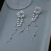 Brincos de Pérola Coreanos de Alta Qualidade 2026, Agulha de Prata Estilo Vintage Chanel Diamante Colorido Estrela de Oito Pontas Brincos de Tarraxa Atacado