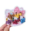 Elásticos de cabelo, tiaras e cordões de cabelo de desenho animado para meninas, com um design pequeno e fofo na cor café com leite, perfeitos para outono e inverno.