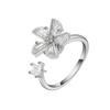 Anillo giratorio de molino de viento de venta caliente transfronteriza para mujer, diseño de nicho con sentido simple, simple, simple, simple, anillo con sentido avanzado.