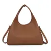 Bolsa tote de alta qualidade transfronteiriça para mulheres, nova coleção outono 2026, bolsa estilo balde com padrão de lichia vintage, adequada para o trabalho e pode ser usada como bolsa transversal