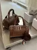 Bolsa Boston estilosa e versátil para mulheres, nova coleção 2026, com um toque de luxo, adequada para o trabalho, para o dia a dia e pode ser carregada como bolsa de mão, bolsa transversal ou bolsa de ombro