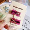 Versión coreana de pinza para el pelo de lazo simple de temperamento infantil, anillo para el pelo, accesorios clásicos de encaje para el pelo de niñas, pinza lateral para el flequillo, venta al por mayor