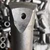Broca de una sola hoja, Filo de aleación de acero de tungsteno, Accesorios de perforación para capas de roca dura, Compatible con equipos de perforación neumática de roca